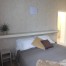Double bedroom with shelf above the bed for emptying pockets, wardrobe, private bathroom in the room.