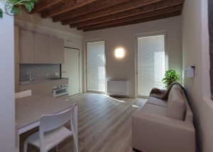 Zona giorno Loft 1 cucina e soggiorno con divano