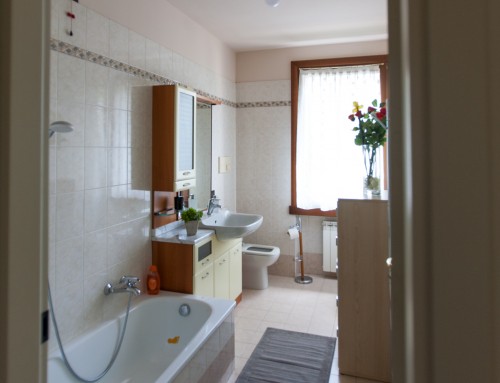 Castle view bathroom with bath and window